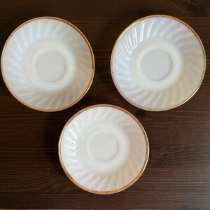 3 Fire King vintage milk glass swirl pattern saucers with gold tone edge 5.75”